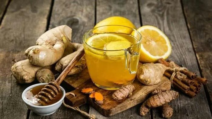 What are the benefits of honey lemon ginger water during seasonal transitions?